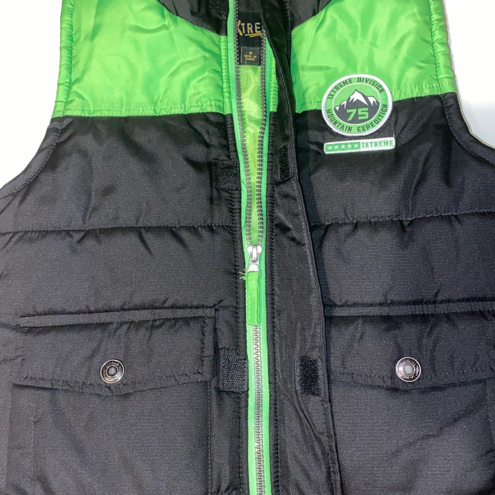 Boys green and black puffer vest.